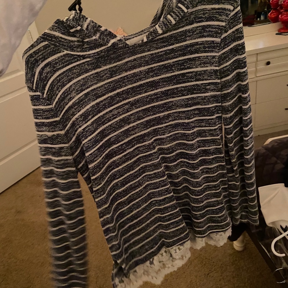 sweater. lace on bottom